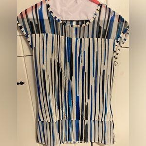 Karen Millen cap sleeve top with sheer shoulder yokes and peplum hem. Size 4.